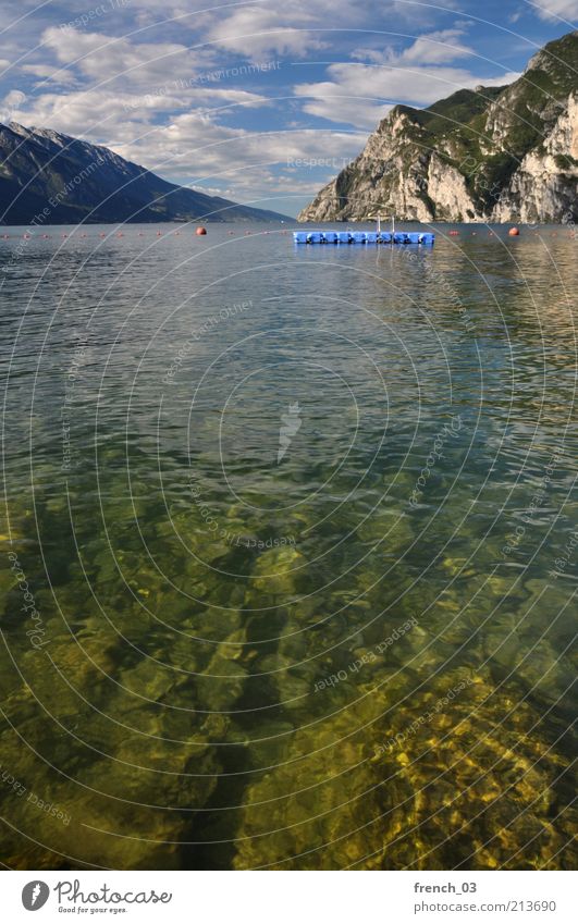 cold clear water Calm Vacation & Travel Summer Mountain Landscape Water Sky Clouds Beautiful weather Lake Lake Garda Free Blue Green Moody Trentino Alps Rock