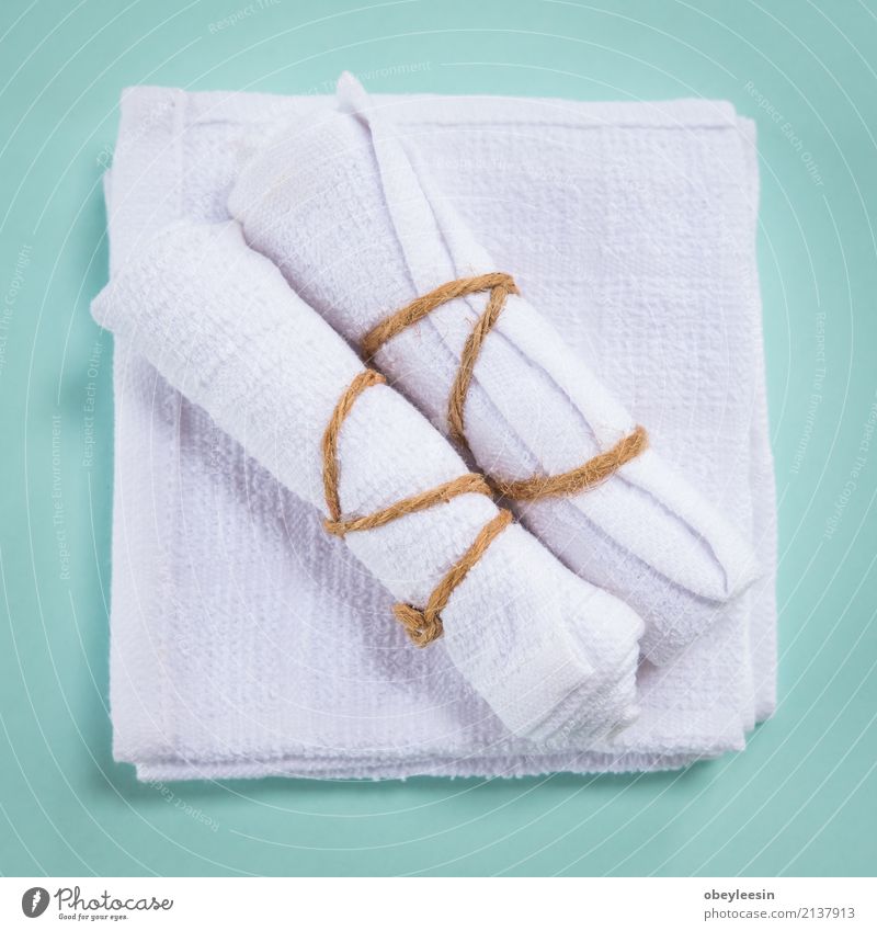 Rolled up white spa towels, selective focus Luxury Design Wellness Relaxation Spa Bathroom Cloth Fresh Bright Natural New Clean Soft Blue White isolated absorb