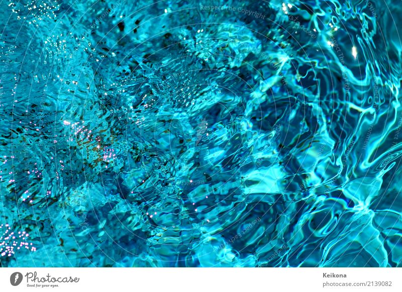 Swirling cyan blue water with light waves and spots. Environment Nature Water Drops of water Sun Summer Waves Coast Lakeside Beach Ocean River