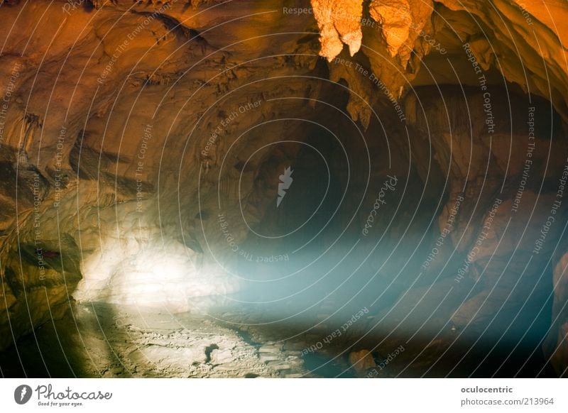 Underground Earth Summer Cave Stalactie cave Stalactite Guilin China Old Dream Cold Shadow Beam of light Blue Orange Long exposure Floodlight Colour photo
