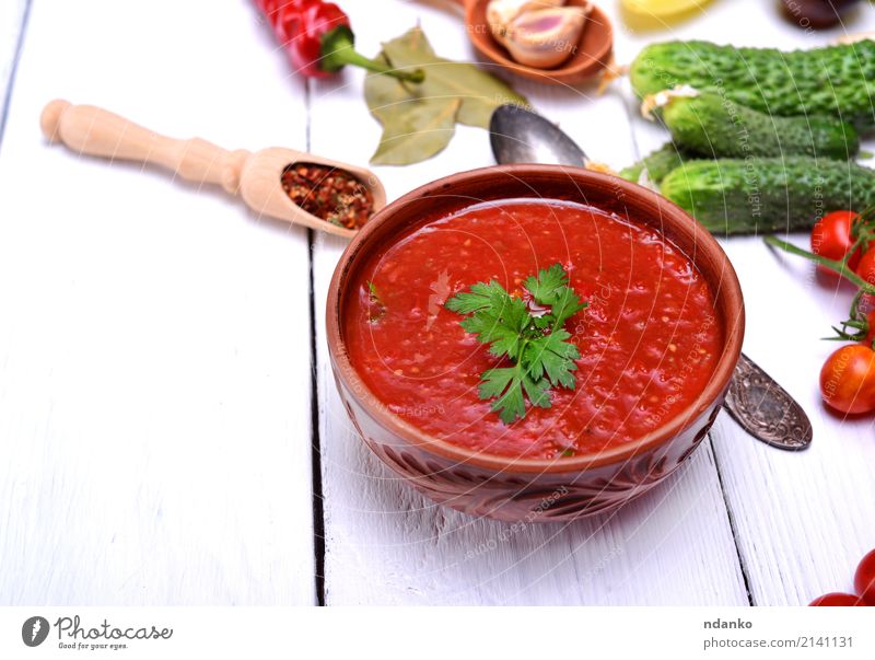 Cold gazpacho soup Vegetable Soup Stew Herbs and spices Nutrition Lunch Dinner Vegetarian diet Diet Plate Spoon Table Kitchen Wood Fat Fresh Delicious Natural