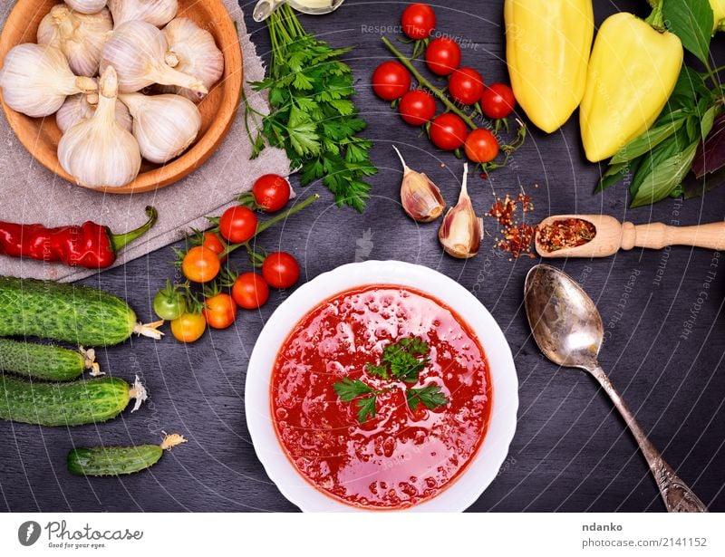 Fresh cold tomato and vegetable soup Vegetable Bread Soup Stew Herbs and spices Nutrition Lunch Dinner Vegetarian diet Diet Plate Spoon Summer Table Kitchen