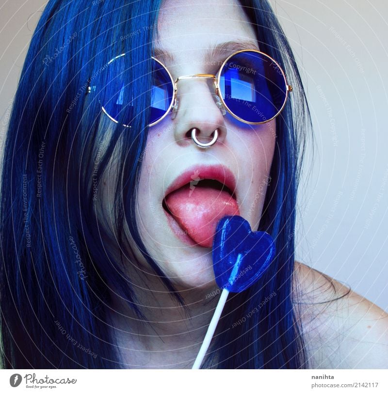 Young woman with blue hair and blue glasses licking a lollipop Candy Lollipop Eating Lifestyle Style Beautiful Skin Face Human being Feminine