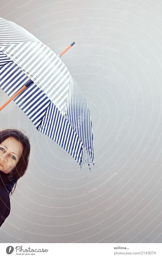smiling woman with umbrella and a lot of text space Feminine Woman Adults 1 Human being Weather Umbrella Brunette Happiness Copy Space Striped