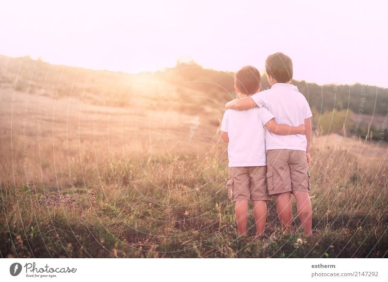 brothers watching the sunset Lifestyle Children's game Human being Masculine Toddler Boy (child) Parents Adults Brothers and sisters Family & Relations
