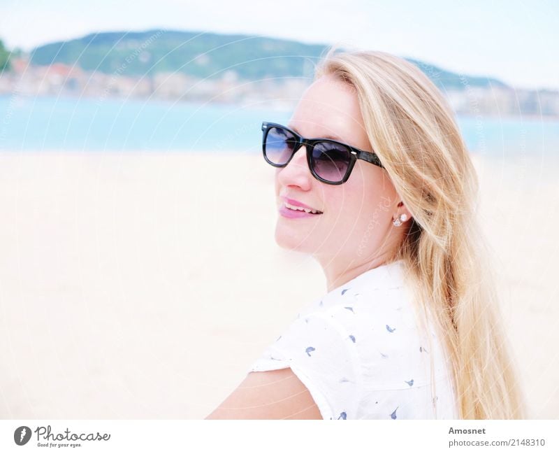 Blonde young woman on the beach with sunglasses Lifestyle Relaxation Vacation & Travel Tourism Beach Human being Feminine Woman Adults 1 18 - 30 years