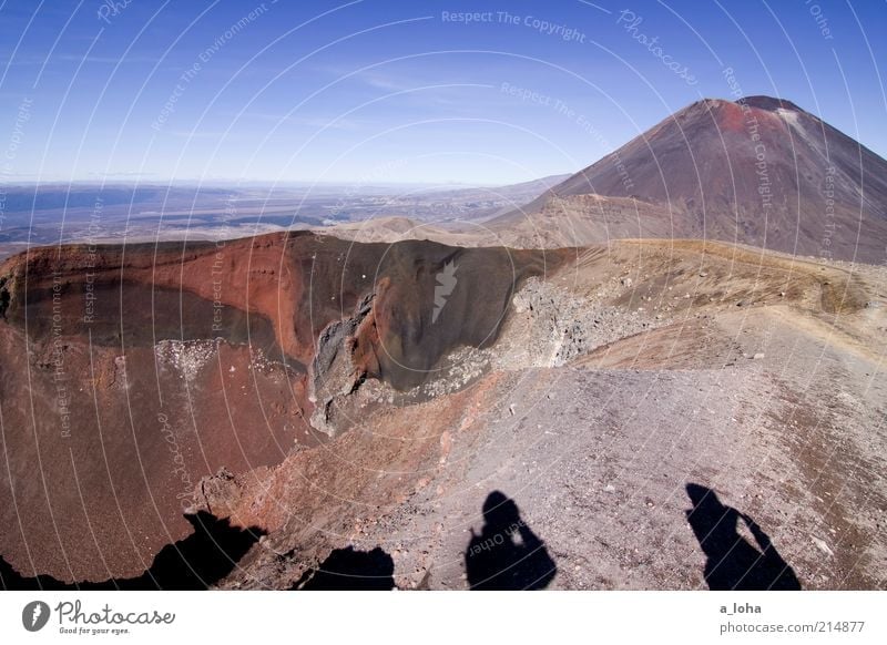 red crater Adventure Far-off places Hiking 2 Human being Landscape Elements Sky Rock Mountain Volcano Volcanic crater Exotic Gigantic Tall Red Power Wanderlust