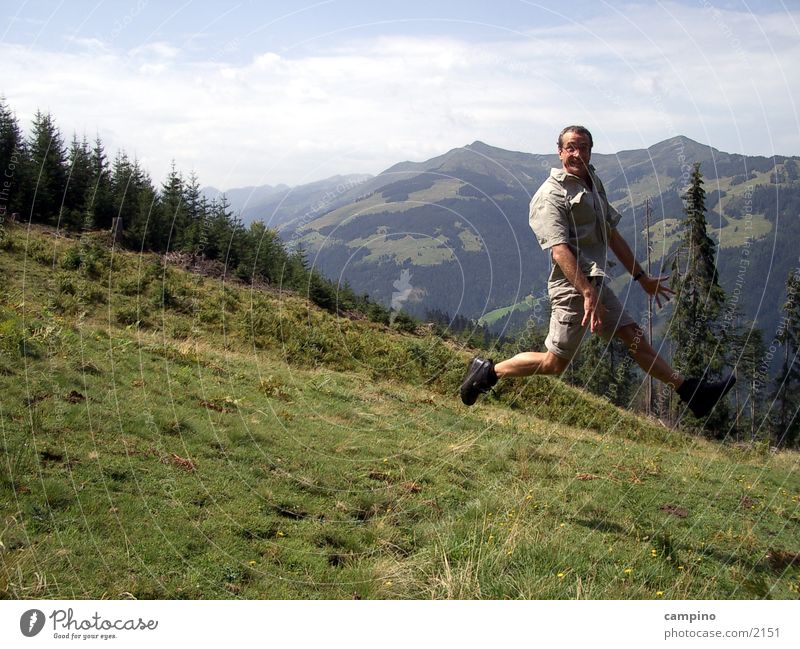 jump Alpine pasture Summer Man Mountain Joy