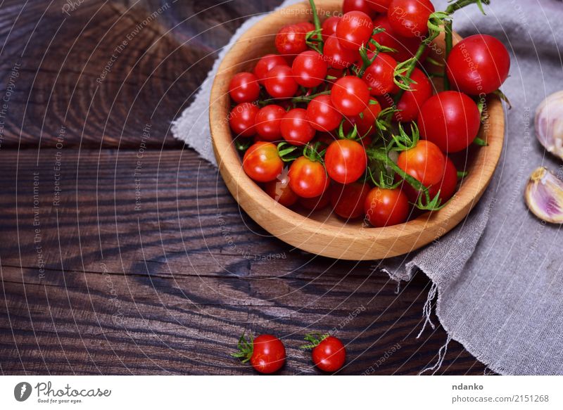 Fresh red cherry tomatoes Vegetable Bowl Wood Eating Small Red Tomato Cherry ripe empty space Top Tasty Ingredients food Colour photo Deserted Copy Space left