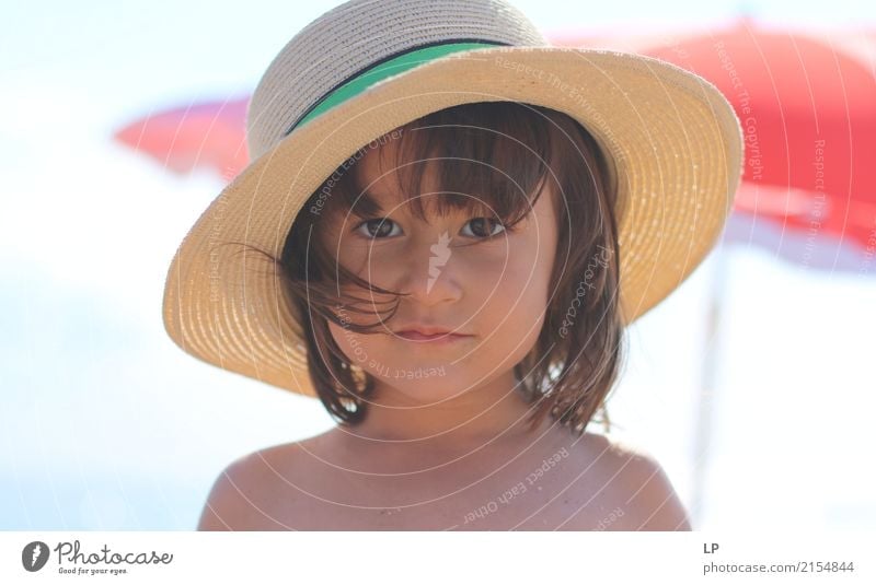 Girl with a straw hat Lifestyle Luxury Elegant Style Beautiful Parenting Education Human being Feminine Child Baby Parents Adults Brothers and sisters