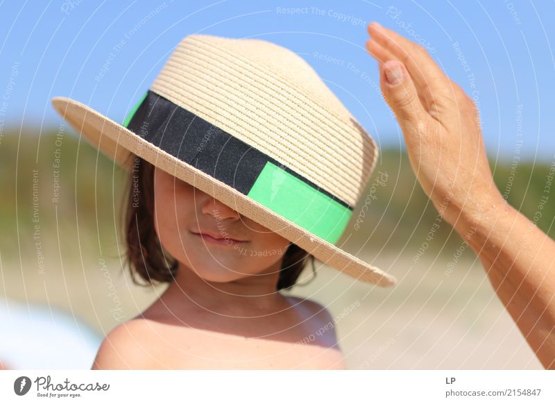 Hat on your head Lifestyle Elegant Style Joy Leisure and hobbies Playing Vacation & Travel Mother's Day Parenting Education Human being Feminine Child Baby