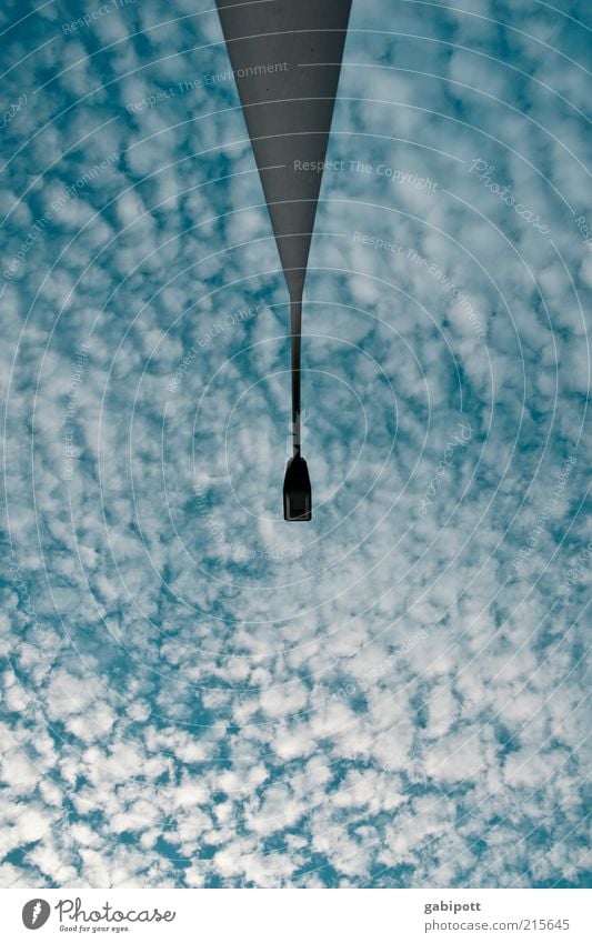 Cloudy Environment Sky Clouds Weather Exceptional Blue Surrealism Symmetry Lantern Lamp post Subdued colour Exterior shot Deserted Day Worm's-eye view