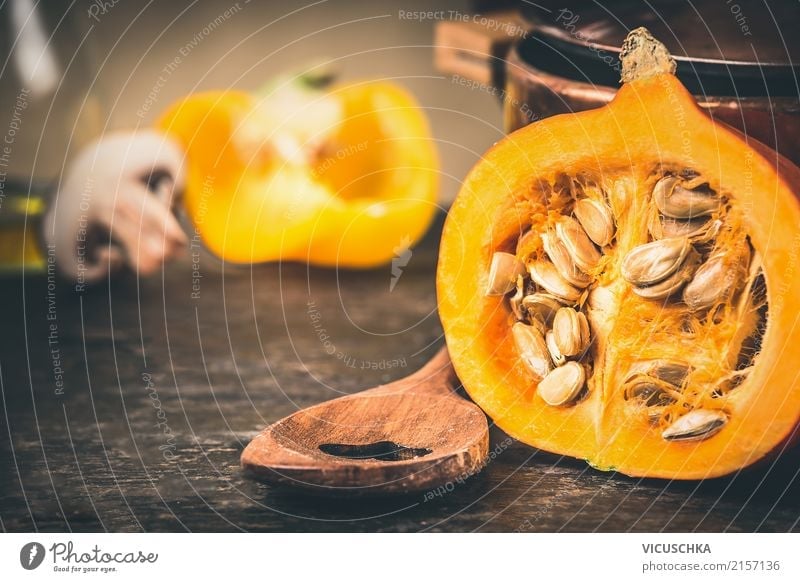 Half pumpkin with seeds and cooking spoon Food Vegetable Nutrition Organic produce Vegetarian diet Diet Spoon Style Design Healthy Eating Life Table Kitchen