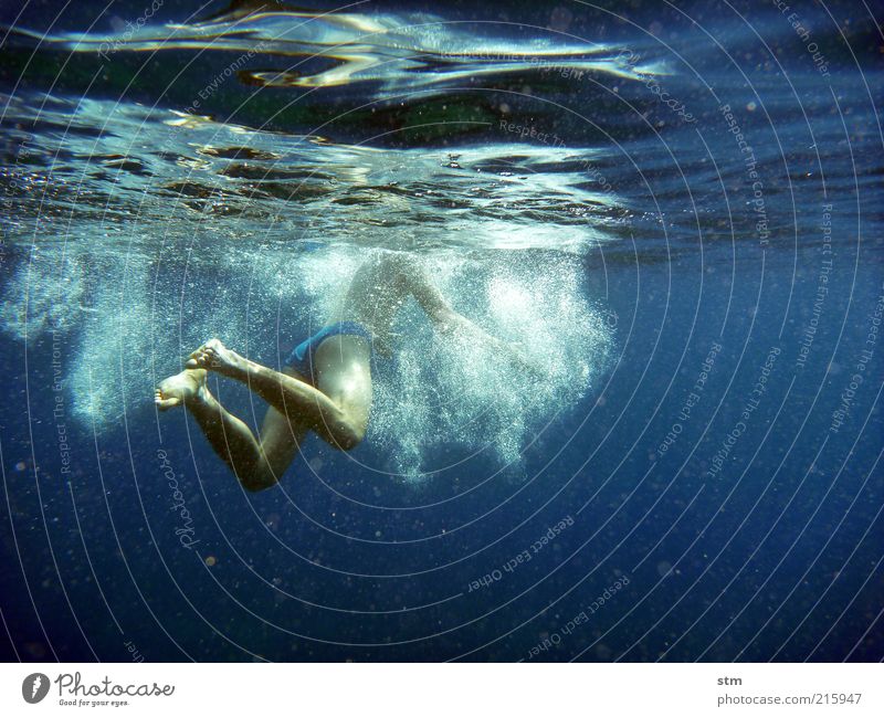 Underwater shot of a swimming man Life Well-being Relaxation Swimming & Bathing Leisure and hobbies Vacation & Travel Freedom Summer Summer vacation Sun Ocean