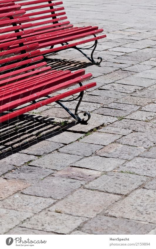 two-seater Venice Wood Metal Gray Red Line Park bench Seating Empty Cobblestones Perspective Colour photo Exterior shot Abstract Pattern Structures and shapes