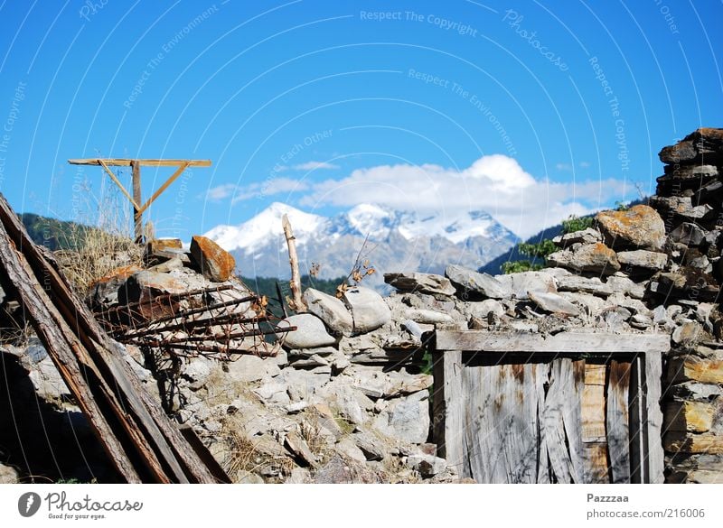 Former room with view Far-off places Mountain Landscape Air Beautiful weather Caucasus Mountains Peak Snowcapped peak House (Residential Structure) Ruin