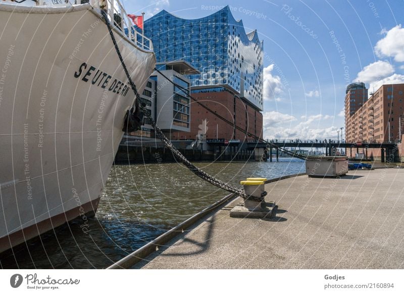 View of the Elbphilharmonie along a ship in Hamburg's inland harbor Germany Capital city Port City House (Residential Structure) Harbour Building Architecture
