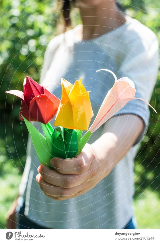 Woman hold bouquet of origami flowers Design Decoration Craft (trade) Hand Art Nature Flower Tulip Paper Bouquet Yellow Pink Red White Colour Origami