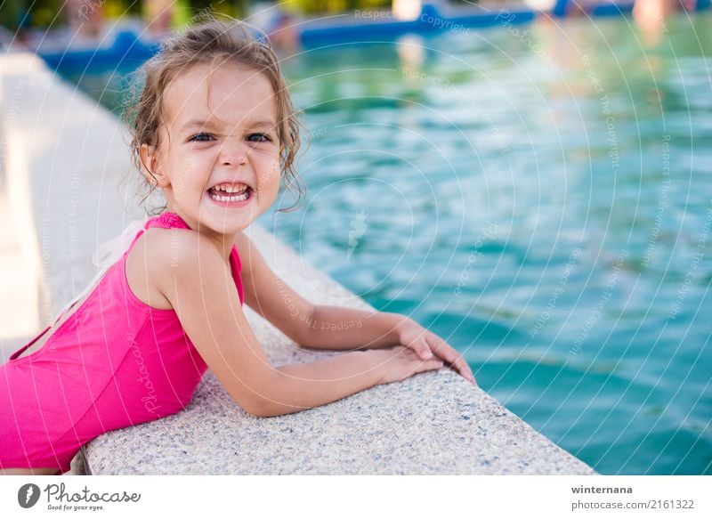 Smile on the swimming pool Girl 1 Human being 3 - 8 years Child Infancy Water Summer Swimming pool Swimming trunks Blonde To enjoy Laughter Playing Emotions Joy