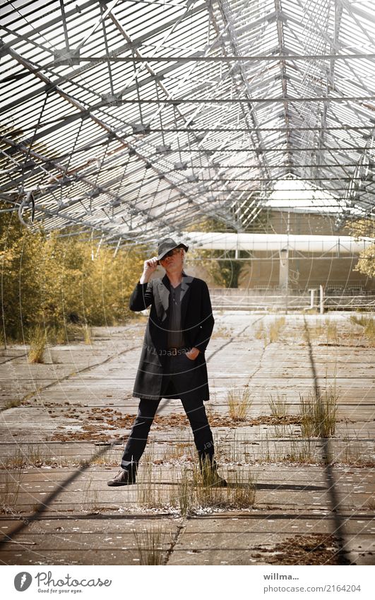 Man with floppy hat and frock coat in an old, empty, overgrown greenhouse Frock coat Sunglasses Hat White-haired Cool (slang) Uniqueness Decline Easygoing