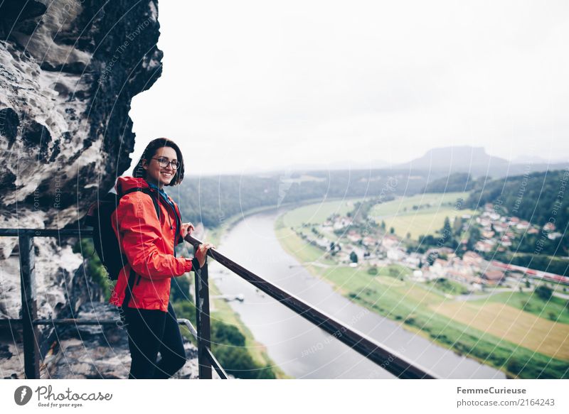 Hiking (01) Feminine Young woman Youth (Young adults) Woman Adults Human being 18 - 30 years 30 - 45 years Adventure Nature Saxon Switzerland Rain jacket Red