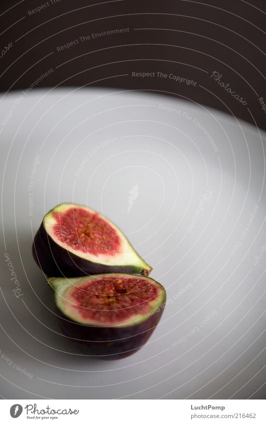 half&half Fig Red Violet Fruit flesh Juicy Fruity Sheath Sliced Plate Edge of a plate Brown Raw Healthy Delicious Mature Sweet Healthy Eating Nutrition