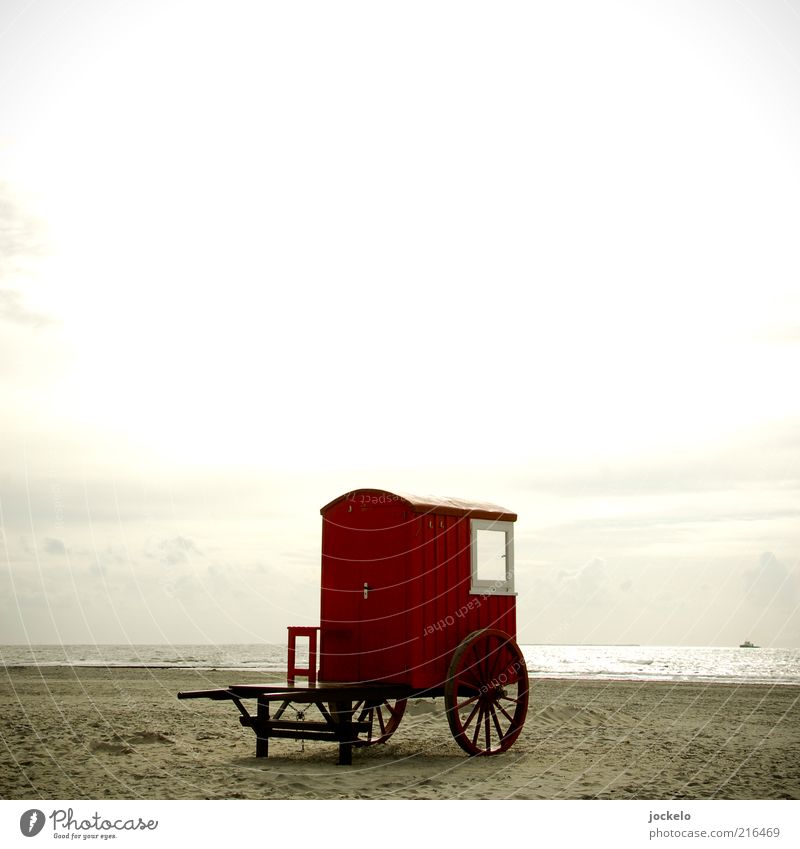 Red wagon Camping Summer Ocean Environment Nature Landscape Water Sky Cloudless sky Horizon Sun North Sea Determination Beach Trailer Carriage Old Deserted