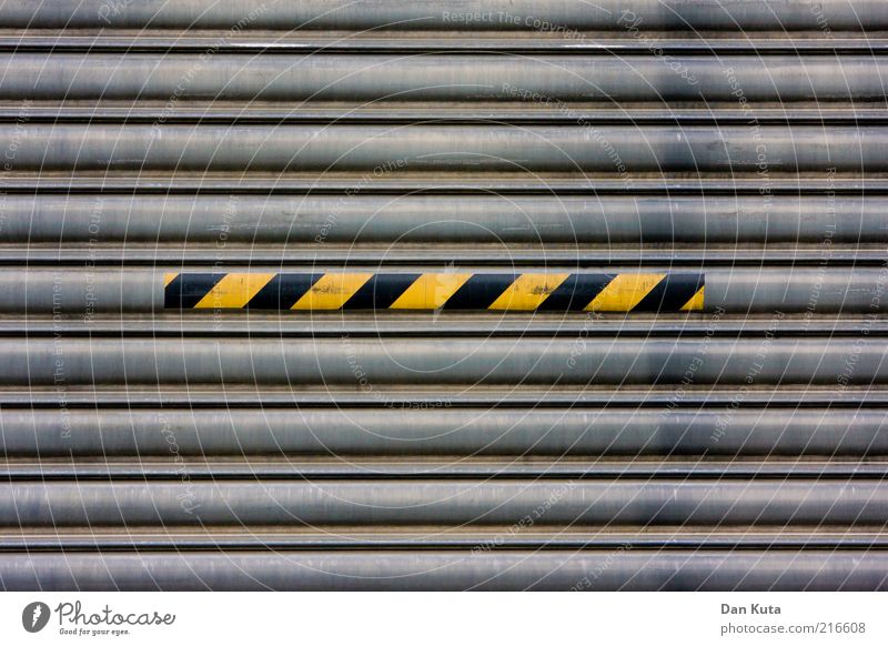 disorder Gate Metal Stripe Second-hand Dirty Oily Warn Warning colour Warning stripes Signs and labeling Caution Yellow Black yellow-black striated Colour photo