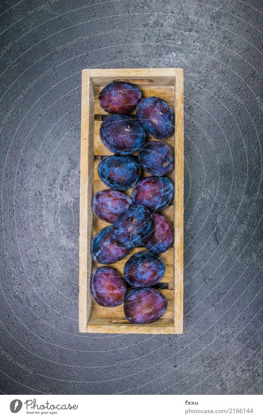 Fresh plums in a wooden box Plum Fruit Splash of water Drops of water Healthy Healthy Eating To enjoy Nutrition Delicious Edible Beautiful Sweet Food