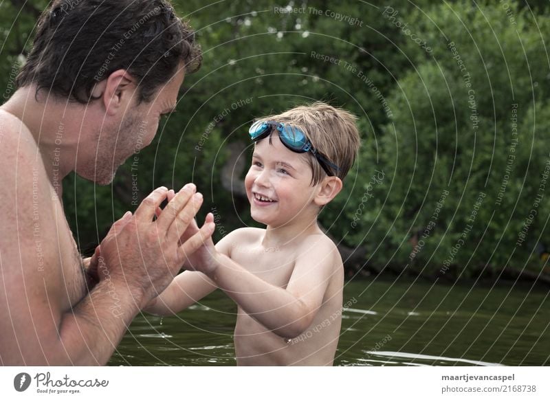 Father and son have fun in the water Human being Masculine Child Boy (child) Man Adults Parents Family & Relations Infancy Life 2 3 - 8 years 30 - 45 years