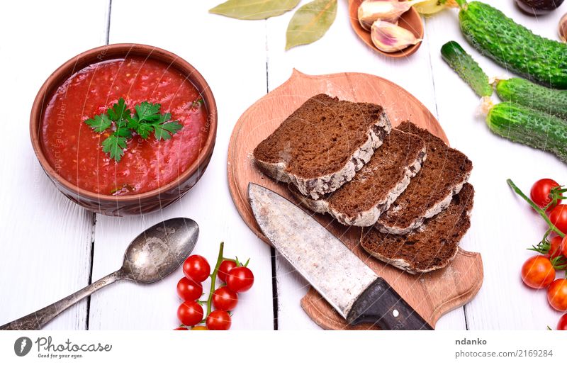 Gazpacho spanish cold soup Vegetable Bread Soup Stew Herbs and spices Nutrition Lunch Dinner Vegetarian diet Diet Plate Table Kitchen Wood Fat Fresh Delicious