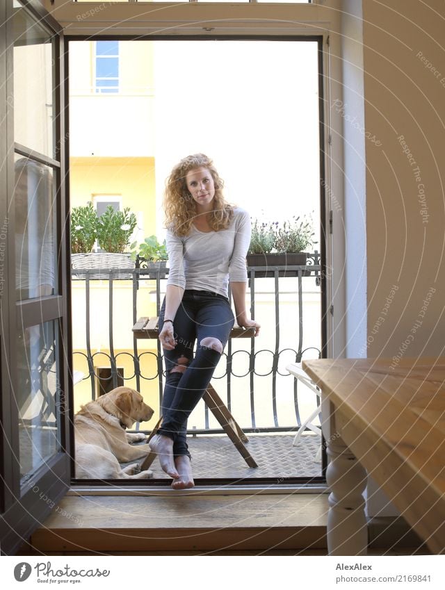 young slim redhead woman on her balcony with blonde labrador Lifestyle Style Joy pretty Harmonious Flat (apartment) Balcony Balcony plant Young woman