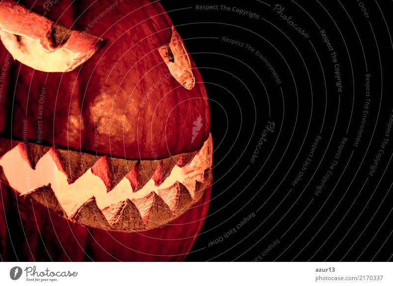 Side view halloween pumpkin smile with fire burning eyes mouth Face Leisure and hobbies Handicraft Decoration Party Hallowe'en Art Work of art Culture