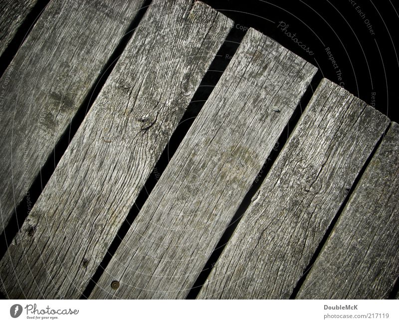 footbridge Wooden board Old Sharp-edged Natural Dry Gray Black Calm Footbridge Weathered Gloomy Simple Day Colour photo Subdued colour Exterior shot Close-up