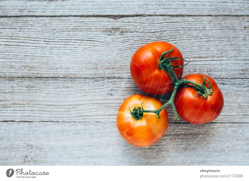 Close-up of fresh, ripe tomatoes on wood background Vegetable Herbs and spices Vegetarian diet Diet Summer Garden Group Nature Plant Leaf Wood Growth Fresh