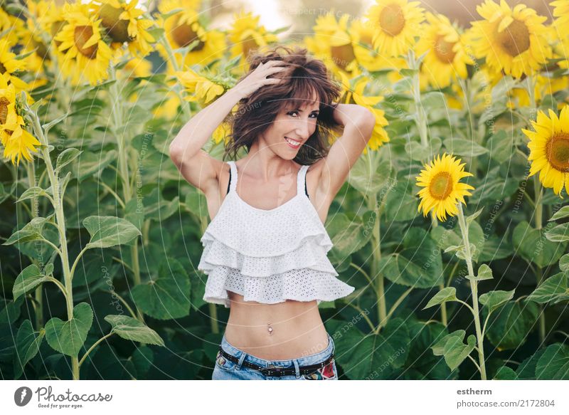 smiling girl in Sunflower Field Lifestyle Joy Wellness Contentment Human being Feminine Young woman Youth (Young adults) Woman Adults 1 30 - 45 years Plant
