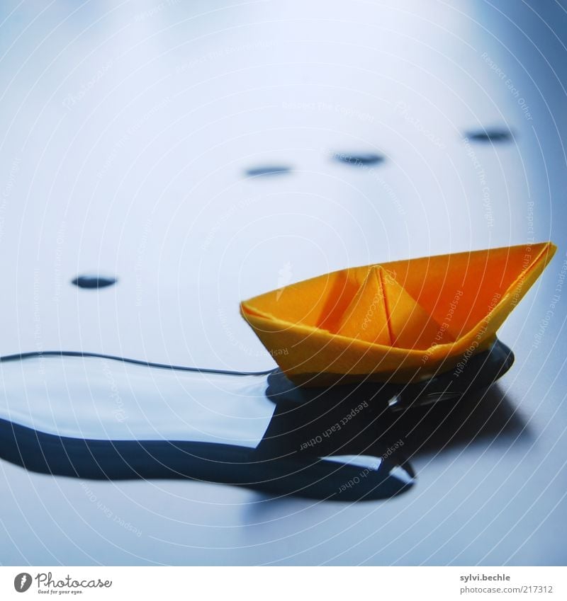 I let myself drift ... Boating trip Wet Blue Calm Relaxation Watercraft Paper boat Orange Colour photo Multicoloured Interior shot Detail Copy Space top Light