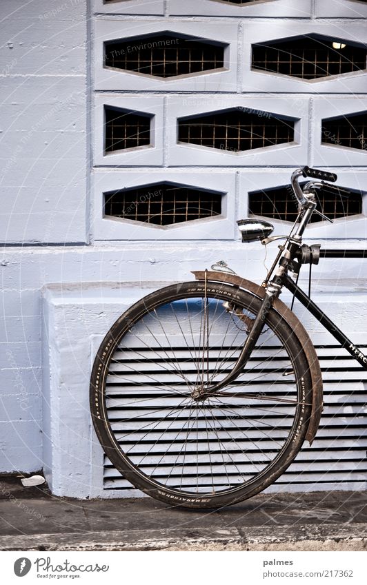 form-related Style Means of transport Bicycle Concrete Metal Steel Simple Colour photo Exterior shot Pattern Section of image Partially visible Detail Wheel