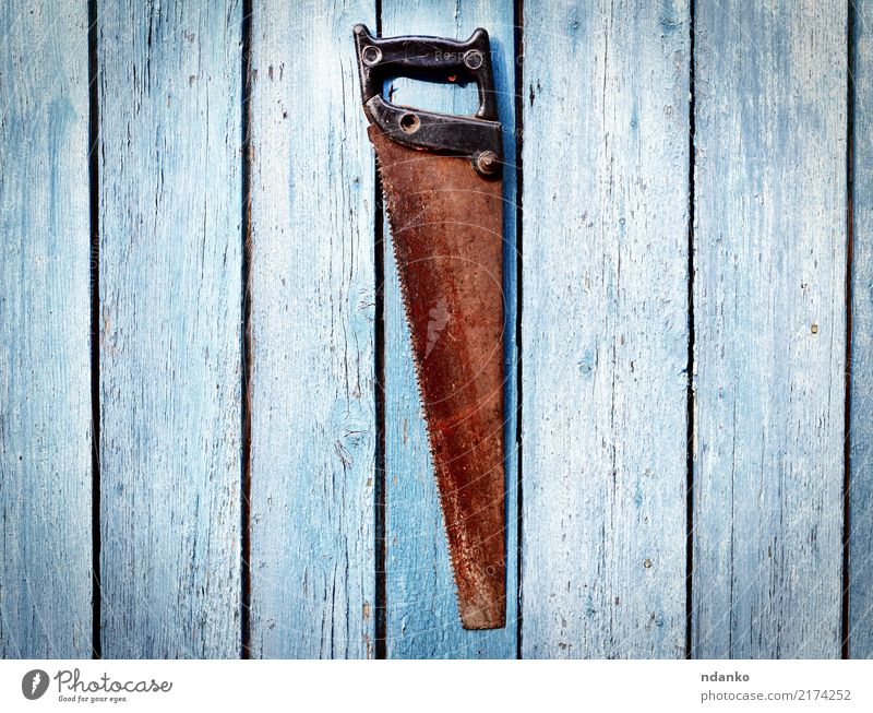rusty metal hand saw Work and employment Tool Saw Hand Wood Metal Rust Old Retro background vintage equipment Antique construction worn handle hardware blade