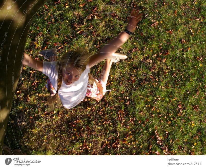 yuch Girl Infancy Nature Air Autumn Beautiful weather Leaf Meadow Blonde Long-haired Movement Laughter Playing Jump Romp Brash Free Happiness Crazy Joy