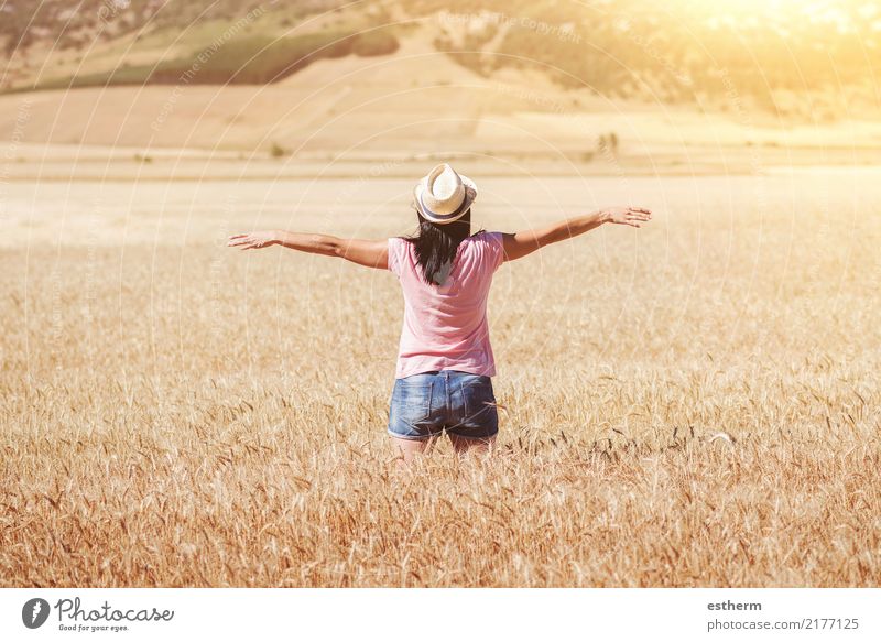 Happy girl in the wheat field Lifestyle Joy Wellness Harmonious Contentment Vacation & Travel Adventure Freedom Human being Feminine Young woman