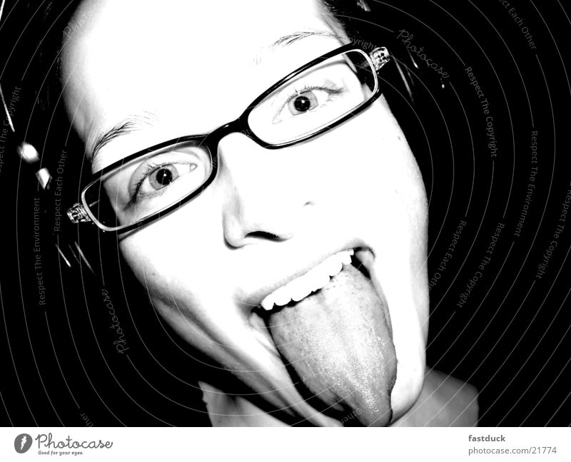 let some air out Feminine Black White Eyeglasses Emotions Portrait photograph Headphones Woman Joy Facial expression Tongue kiss Teeth