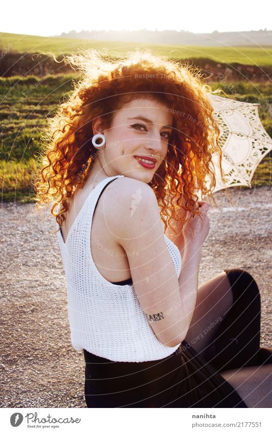 Young pretty redhead woman at sunset Lifestyle Style Beautiful Human being Feminine Young woman Youth (Young adults) 1 18 - 30 years Adults Nature Field Fashion