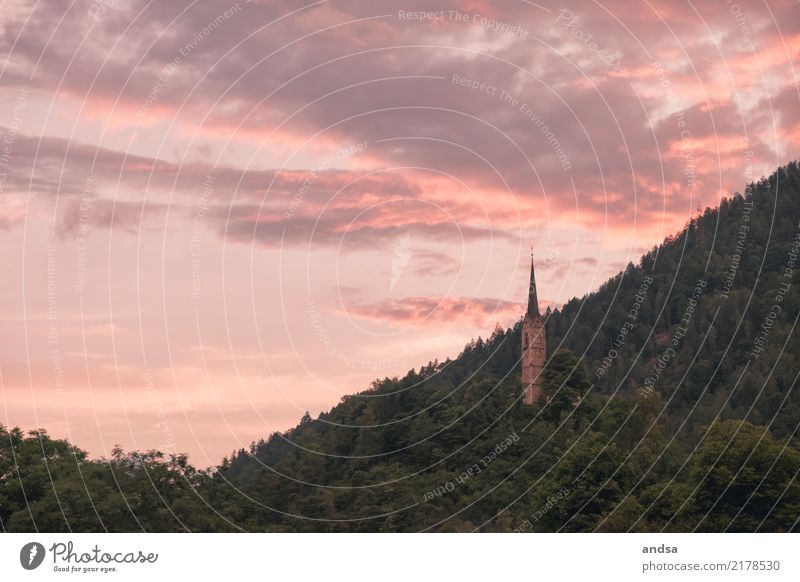 Sunset in the mountains with church tower Sunrise colors Sky Hill forests Forest Church spire castle Landscape Exterior shot Nature Deserted Mountain