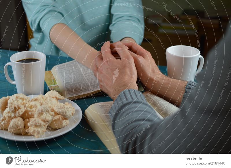 pray together Human being Woman Adults Man Hand Sweater Table Cup Baked goods Coffee Touch Together Blue Gray Turquoise Virtuous Trust Safety Loyal Sympathy