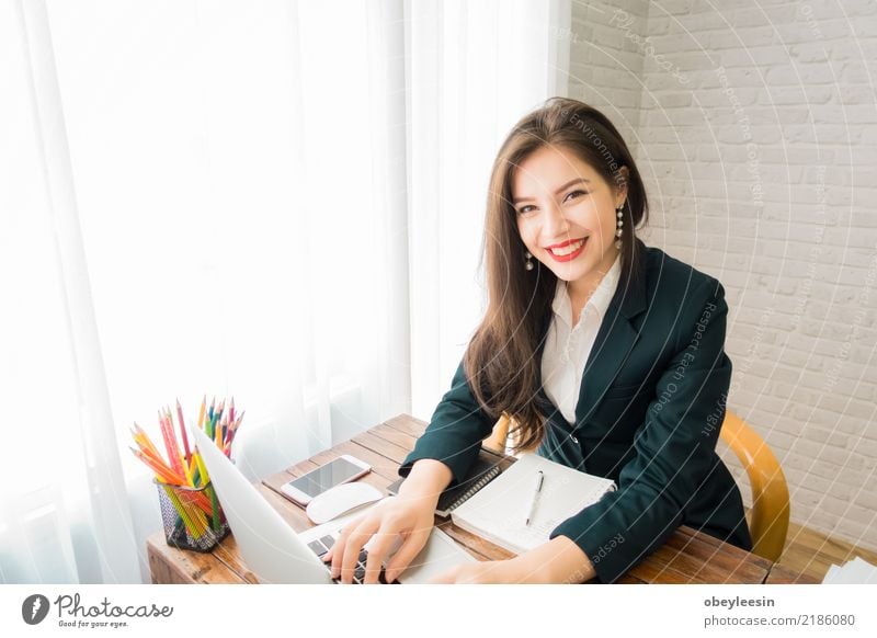 A business woman working on the laptop Lifestyle Design Beautiful Desk Work and employment Profession Office Business Telephone Computer Notebook Technology