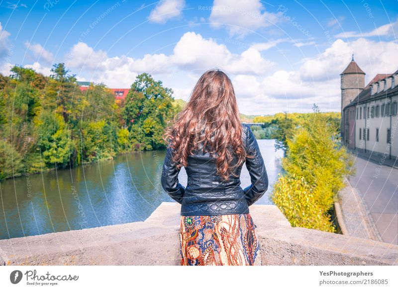 Girl looking toward the river and cloudscape Lifestyle Relaxation Leisure and hobbies Freedom Feminine Woman Adults Nature Landscape Sky Clouds Horizon Autumn