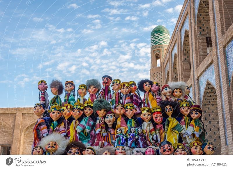 Uzbek puppets dressed in traditional clothes Style Design Vacation & Travel Tourism Decoration Human being Art Building Architecture Fashion Dress Toys Ornament