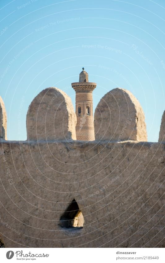 Old city wall and minaret, Khiva, Uzbekistan Style Design Decoration Sand Town Old town Skyline Architecture Ornament Religion and faith Tradition Islam Moslem