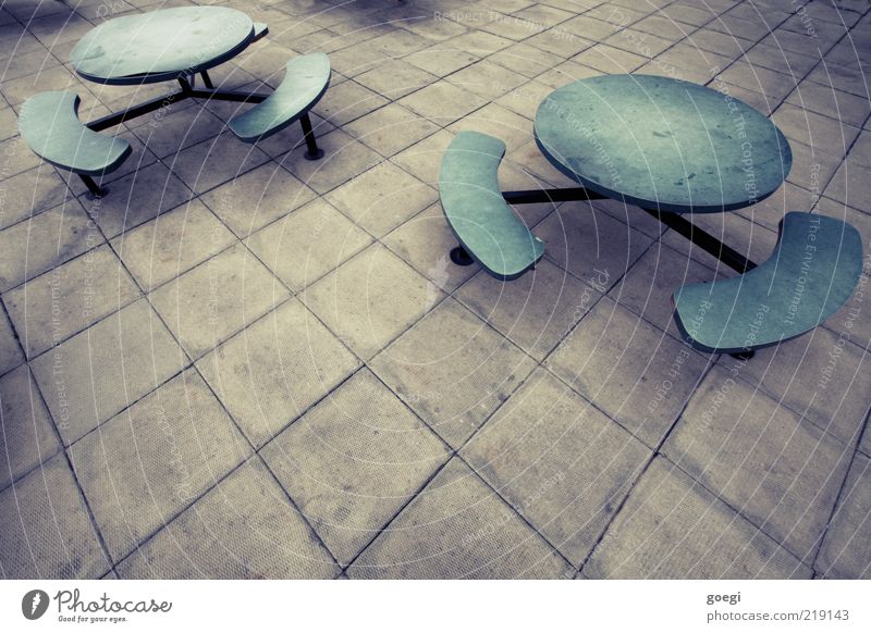 Aaaaaaah... they're coming! Table Bench Concrete slab Stone Wood Metal Plastic Dark Creepy Cold Gloomy Blue Gray Green Fear Deception Colour photo Exterior shot